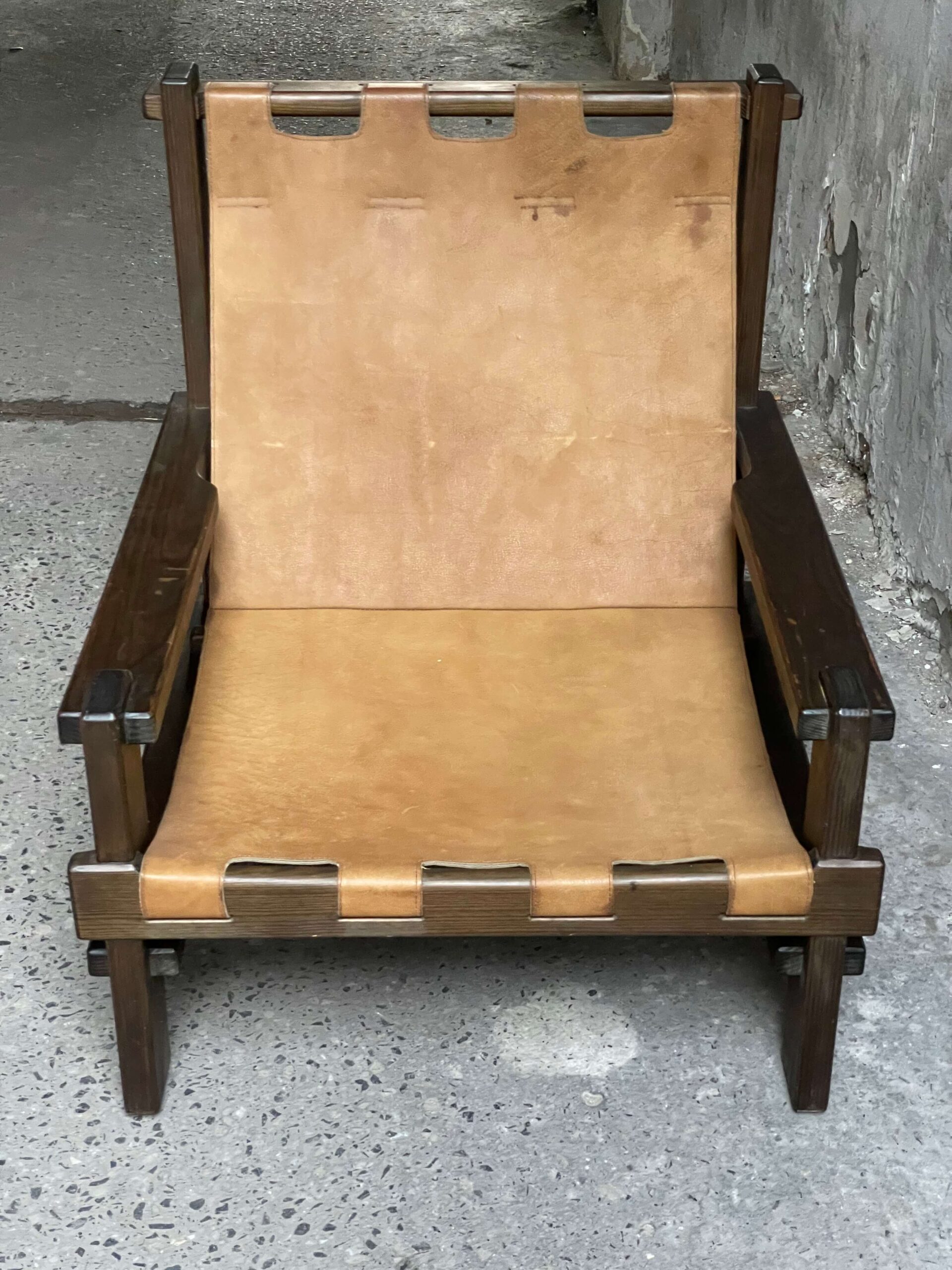 Leather armchair by Carl Straub leather closeup