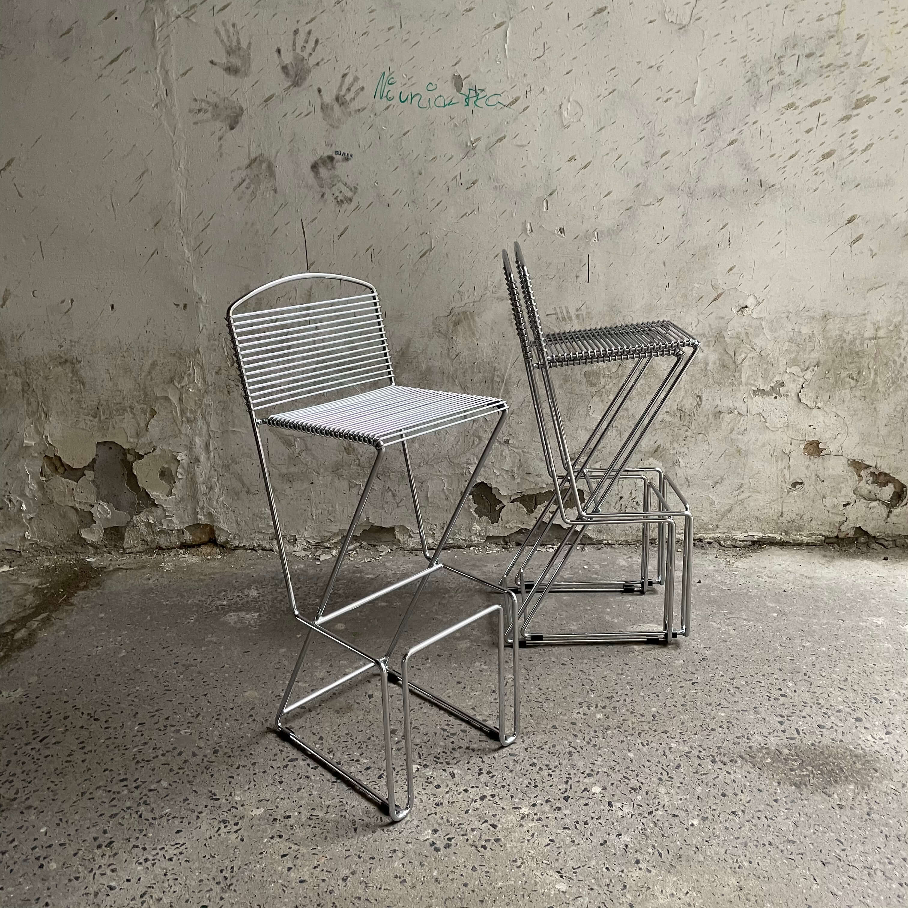 Kreuzschwinger stools warszawa krzeslarz Till Behrens chrome swinging stools german design
